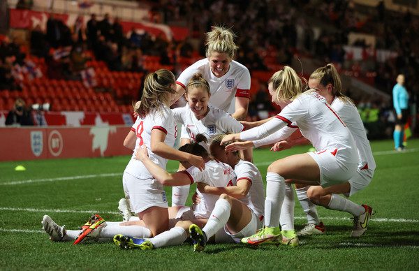  Soccer Football - Women's World Cup Qualifier - Group D - England v Latvia - Keepmoat Stadium, Doncaster, Britain - November 30, 2021 England's Ellen White celebrates with teammates after scoring their third goal and her second to break Kelly Smith?s record to become England?s all-time top scorer Action Images via Reuters/Molly Darlington